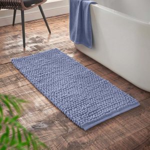 Modrá koupelnová předložka 50x120 cm Aspen Bobble – Bianca